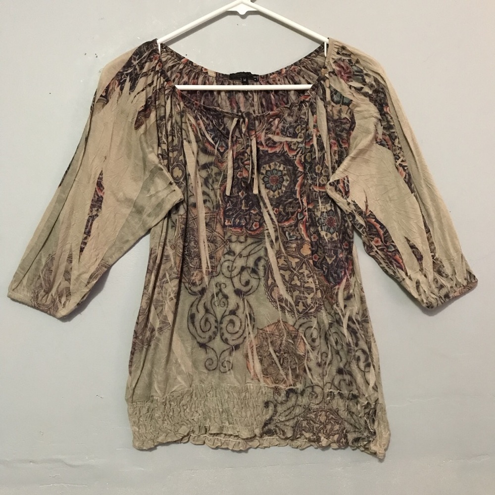 Tan cream top with colorful floral designs